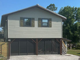 siding repair before After